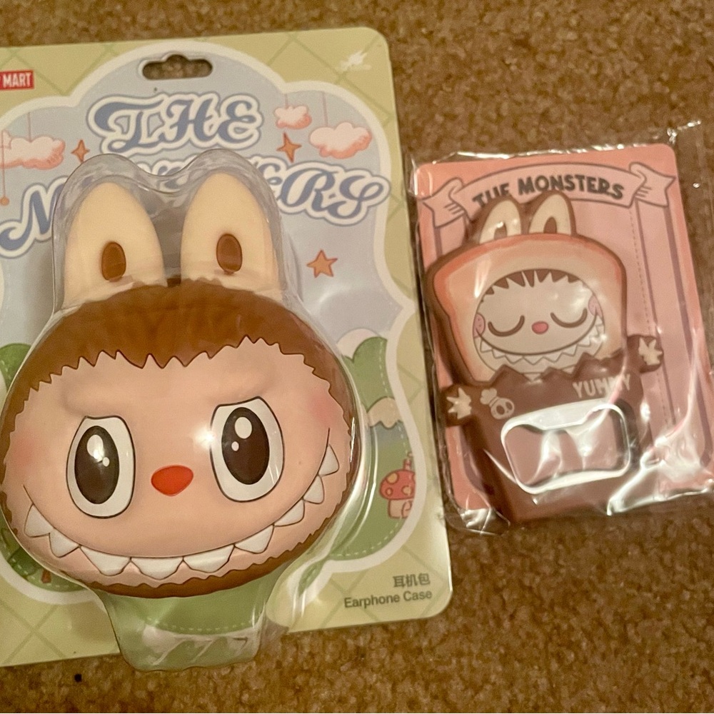 Pop mart the monsters Labubu earphone case and a bottle opener